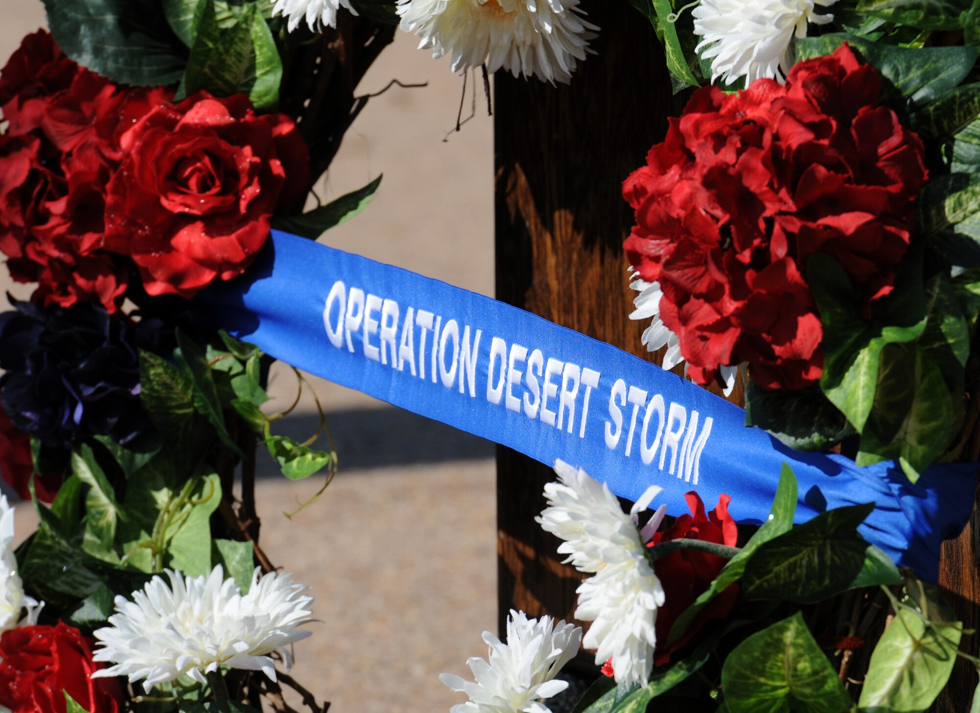 A wreath sits on display during the 81st Training Wing Memorial Day Retreat Ceremony May 26, 2016, Keesler Air Force Base, Miss. The ceremony was held in memory of Operation Desert Storm. (U.S. Air Force photo by Kemberly Groue)