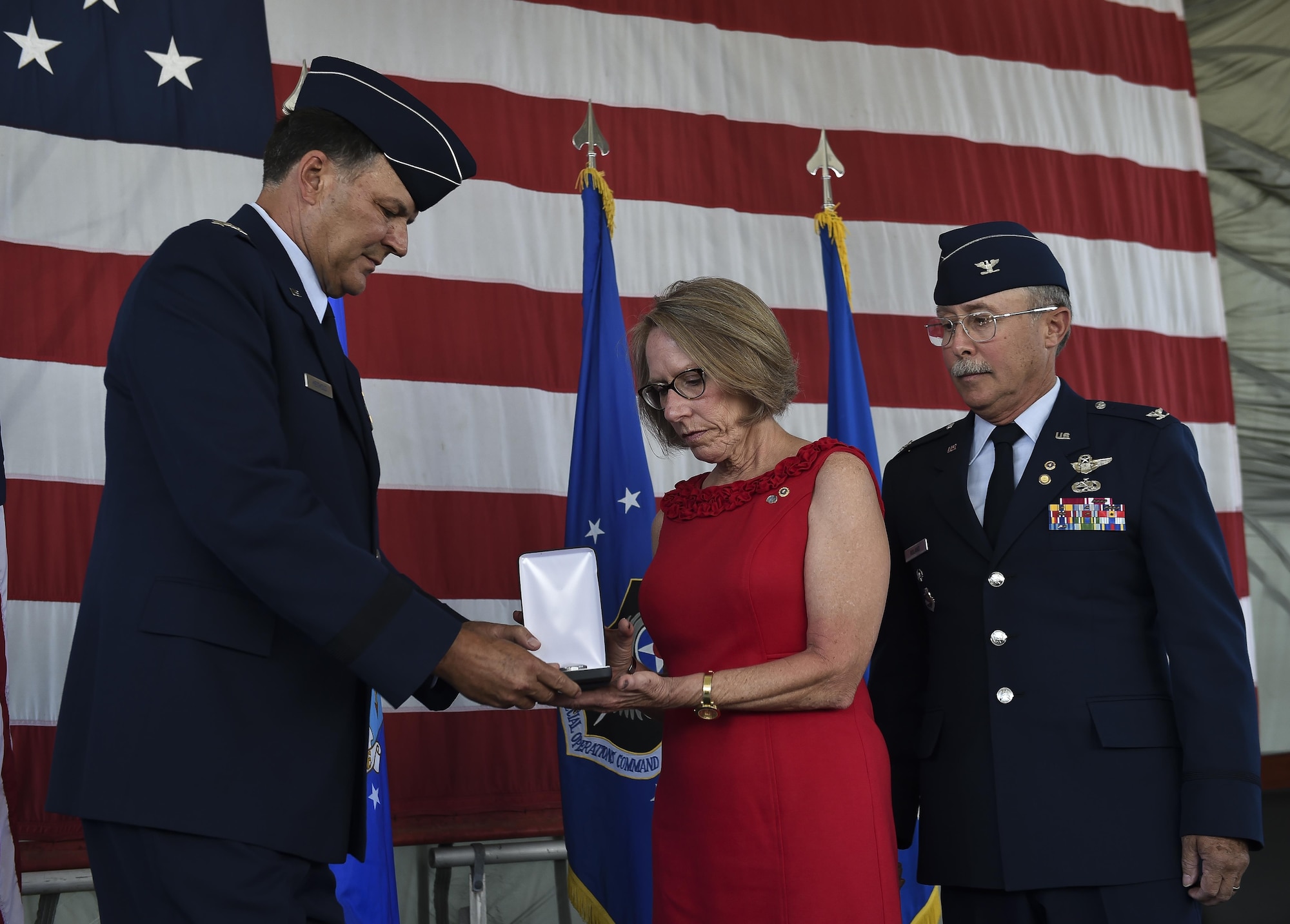The family of Capt. Matthew D. Roland, a Special Tactics officer killed in action, was presented his posthumous Silver Star medal by Lt. Gen. Brad Heithold, commander of Air Force Special Operations Command, Hurlburt Field, Fla., June 1, 2016. Roland gave his last full measure to protect teammates during an ambush on his convoy at an Afghan-led security checkpoint near Camp Antonik, Afghanistan, Aug. 26, 2015. The Silver Star medal is the nation's third-highest valorous combat decoration.  (U.S. Air Force photo by Senior Airman Ryan Conroy/Released)