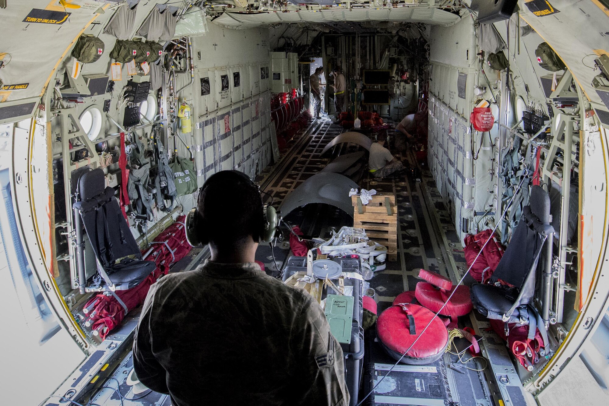 U.S. Air Force Airmen from the 23d Equipment Maintenance Squadron perform system test checks inside an HC-130J Combat King II during an isochronal inspection, May 31, 2016, at Moody Air Force Base, Ga. During an ISO inspection, Airmen perform examinations and maintenance to the entire airframe to increase the overall performance and safety. (U.S. Air Force photo by Airman Daniel Snider/Released)