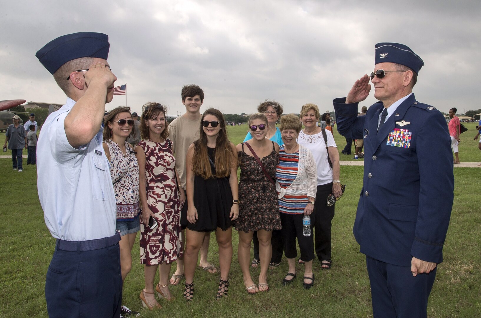 Airman 1st Class Hernando Ortega III renders a salute to his father, retired Col. Hernando
Ortega Jr., after the May 27 Air Force Basic Military Training Graduation at Joint Base
San Antonio-Lackland. The day is significant, as Ortega III will officially begin his Air Force career and his father, Ortega Jr. will retire after more than 30 years of service.