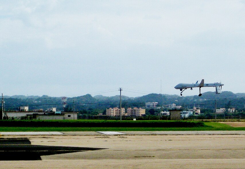 An RQ-1 Predator lands at Aeropuerto Rafael Hernandez Jan. 27, 2010, outside Aguadilla, Puerto Rico. The remotely piloted aircraft are operating out of Puerto Rico in support of Operation Unified Response in Haiti. Airmen from Creech Air Force Base, Nev., are providing 24-hour-a-day full-motion video in real-time to international relief workers on the ground in order to speed humanitarian aid to remote and cut-off areas of the country following the earthquake Jan. 12, 2010. (U.S. Air Force photo/Maj. Jeff Bright)