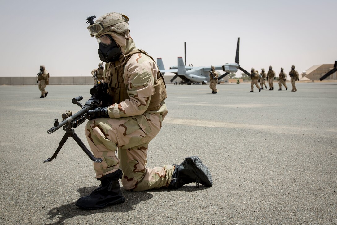 A U.S. Marine with Weapons Platoon, Fox Company, 2nd Battalion, 7th Marine Regiment, Special Purpose Marine Air-Ground Task Force-Crisis Response-Central Command 16.2, posts security during Chemical, Biological, Radiological and Nuclear Defense Training at an undisclosed location in Southwest Asia, May 03, 2016. SPMAGTF-CR-CC is forward deployed in several host nations, with the ability to respond to a variety of contingencies rapidly and effectively. (U.S. Marine Corps photo by Cpl. Trever A. Statz/Released)