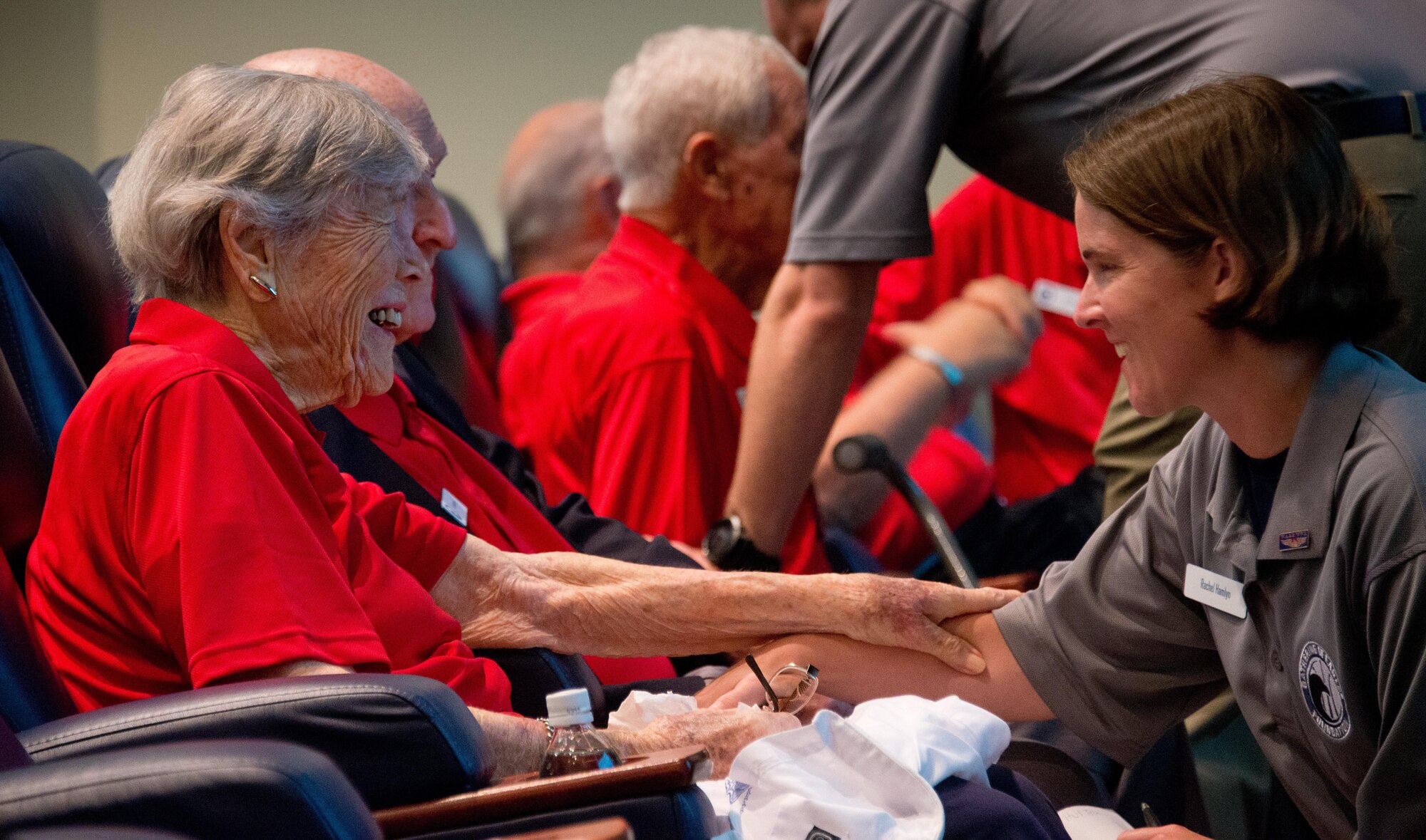 Former Women Airforce Service Pilot Dawn Seymour and Maj. Rachel Hamlyn, an Air Command and Staff College student, share a laugh before the start of the Gathering of Eagles event May 31, 2016, at Maxwell Air Force Base, Alabama. The annual GoE event brings aviation legends to ACSC so they can share their experiences and life lessons with students and faculty. The school's capstone event traces its start to 1980, when retired Brig. Gen. Paul Tibbets was invited to share his flying experiences with ACSC students. Seymour joined the WASP program in 1943 and was one of only 17 women selected to train on the four-engine B-17. (U.S. Air Force by Melanie Rodgers Cox)
