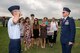 Retiring Col. Hernando J. Ortega, Jr., Air Education and Training Command Aerospace Medicine Division chief, and his son, Airman 1st Class Hernando J. Ortega III, shared a first salute as each offered congratulations to the other after Air Force Basic Military Training graduation parade May 27, 2016, at Joint Base San Antonio-Lackland, Texas. Retiring Col. Ortega, Jr. watched his son, Airman 1st Class Hernando J. Ortega III, graduate from Air Force Basic Military Training at JBSA-Lackland, then headed downtown for his retirement ceremony at the Alamo that same afternoon. (U.S. Air Force photo by Johnny Saldivar)