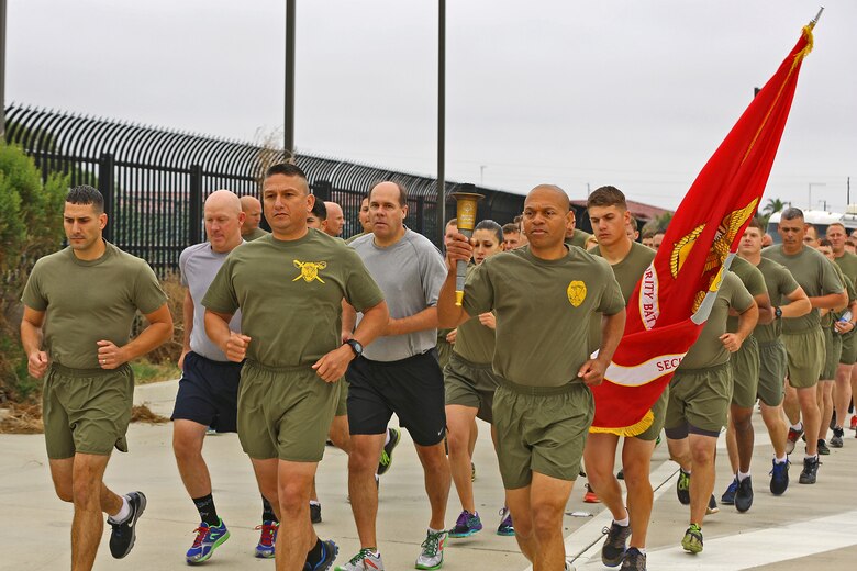 CAMP PENDLETON, Calif. -- More than 30 Marines and police officers from the Security and Emergency Service Battalion and the Camp Pendleton Police Department participate in the 2016 Law Enforcement Torch Run in support of the Special Olympics, June 1. Col. Reginald L. Hairston, commanding officer of SES Bn., Marine Corps Base Camp Pendleton, Marine Corps Installations – West, received the Special Olympics torch from runners of the Oceanside Police Department at the Camp Pendleton Main Gate. SES Bn. Marines then relayed the torch in groups and ran it 17 miles to the Orange County Sheriff’s Police Department in San Clemente.
