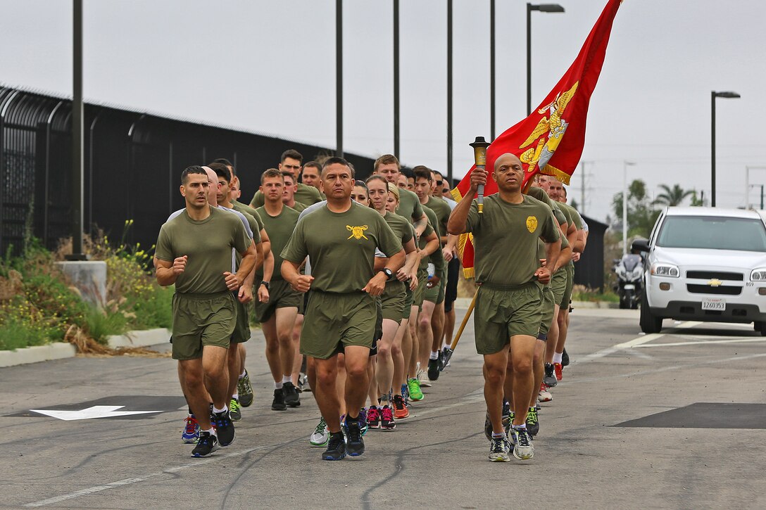 CAMP PENDLETON, Calif. -- More than 30 Marines and police officers from the Security and Emergency Service Battalion and the Camp Pendleton Police Department participate in the 2016 Law Enforcement Torch Run in support of the Special Olympics, June 1. Col. Reginald L. Hairston, commanding officer of SES Bn., Marine Corps Base Camp Pendleton, Marine Corps Installations – West, received the Special Olympics torch from runners of the Oceanside Police Department at the Camp Pendleton Main Gate. SES Bn. Marines then relayed the torch in groups and ran it 17 miles to the Orange County Sheriff’s Police Department in San Clemente.