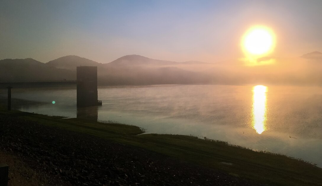 The sun rises over Cave Run Lake, Morehead, Kentucky.