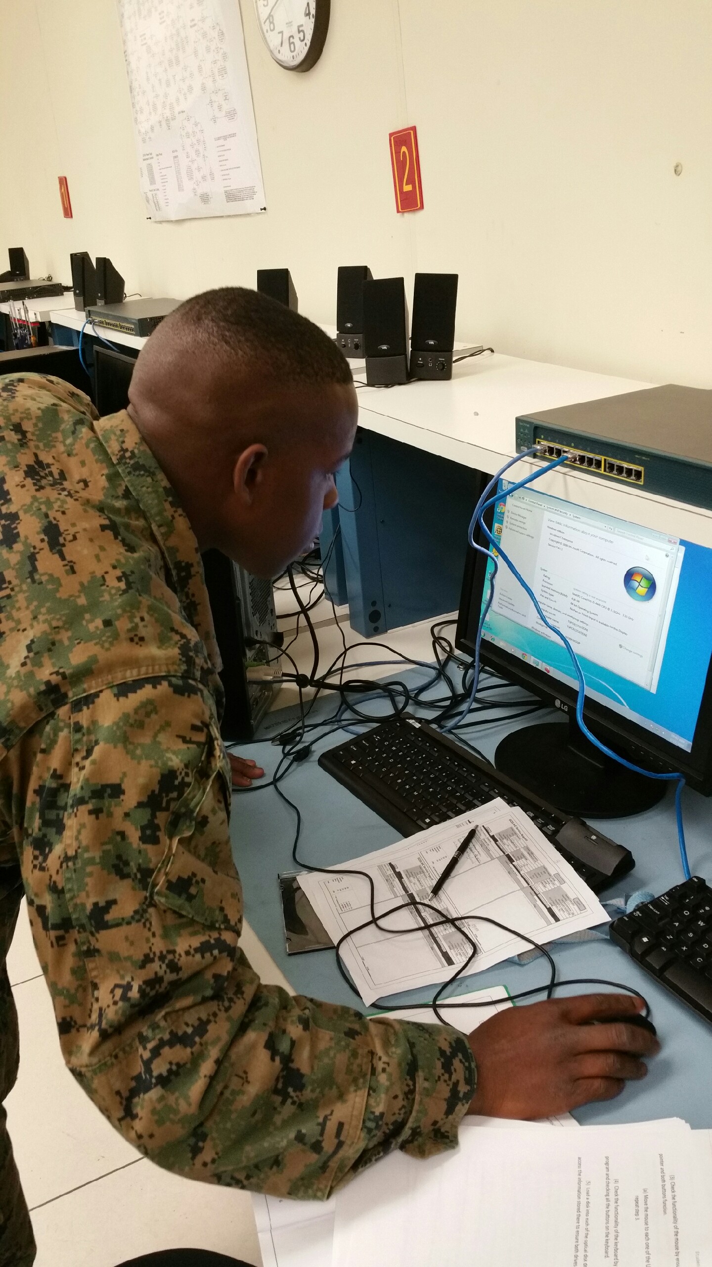 Private First Class Isaiah T. Youngbrown is employing a Mid Tower Desktop during practical application. This prepares Telephone Systems/Personal Computer Repair Course Marines to employ and troubleshoot tactical satellite communications in order to better prepare them for the Fleet Marine Force. Lance Corporal Youngbrown has maintained a 95% GPA.