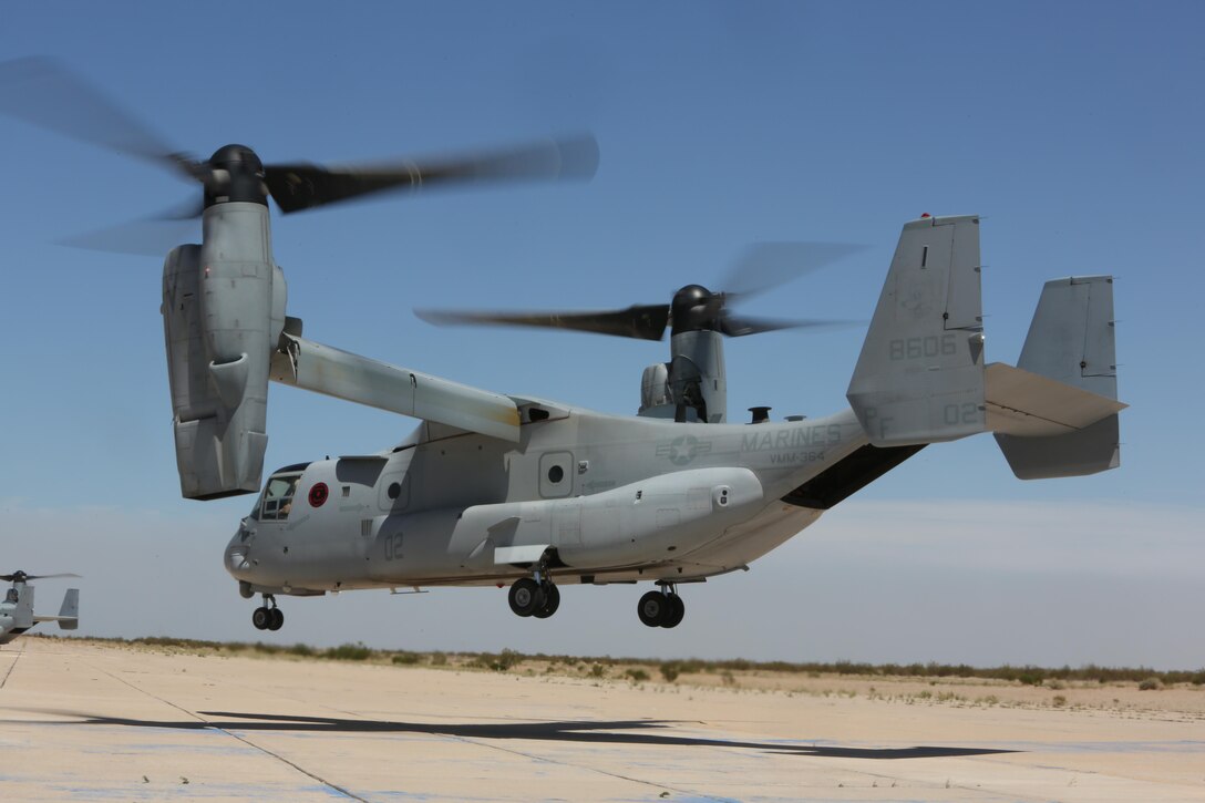 A Marine with Marine Medium Tiltrotor Squadron (VMM) 364 “Purple Foxes” checks the rear of an MV-22B Osprey during section confined area landings at Holtville Airfield, Calif., May 20. Members of the squadron conducted the training to familiarize both pilots and crew chiefs with landing in a small area near other aircraft. (U.S. Marine Corps photo by Pfc. Liah Kitchen/Released)