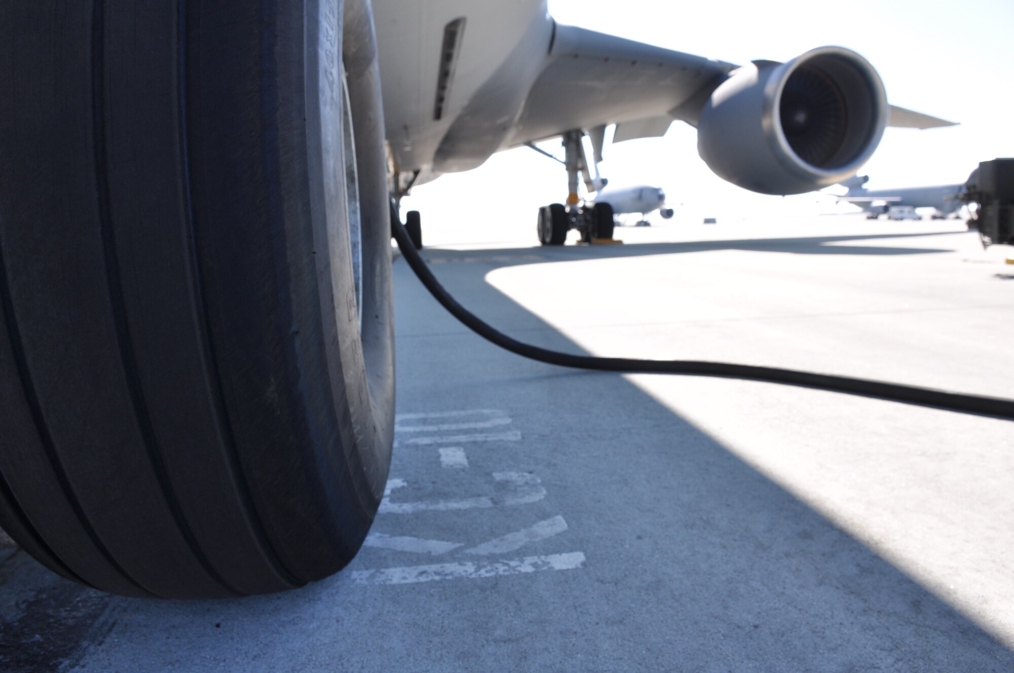 Airmen in the 55th Aerial Port Squadron complete a cargo load of a static KC-10 Extender to maintain readiness April 17, 2016 on the Travis Air Force Base flightline.  (U.S. Air Force photos/Staff Sgt. Madelyn Brown).