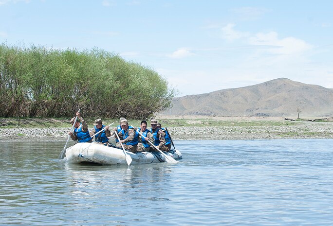 ULAANBAATAR, Mongolia (May 30, 2016) – A soldier from the Alaska National Guard accompanies members of the Mongolian Armed Forces during a small boat riverine training course. The small boat riverine training course is part of Khaan Quest 2016 and is the continuation of last week’s basic water survival course to familiarize MAF soldiers with different survival tactics in different environments that can be used during their deployment or U.N. missions. Khaan Quest 2016 is an annual, multinational peacekeeping operations exercise hosted by the Mongolian Armed Forces, co-sponsored by U.S. Pacific Command, and supported by U.S. Army Pacific and U.S. Marine Corps Forces, Pacific. Khaan Quest, in its 14th iteration, is the capstone exercise for this year’s Global Peace Operations Initiative program. The exercise focuses on training activities to enhance international interoperability, develop peacekeeping capabilities, build to mil-to-mil relationships, and enhance military readiness. 