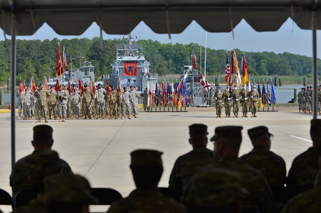 Members of the 7th Transportation Brigade (Expeditionary) wait for the brigade’s change of responsibility ceremony to begin at Fort Eustis, Va., May 26, 2016. The change of responsibility involves command sergeant majors passing responsibility of command, which for this brigade involves responsibility of six battalions that deploy in support of global missions. (U. S. Air Force photo by Staff Sgt. Natasha Stannard)