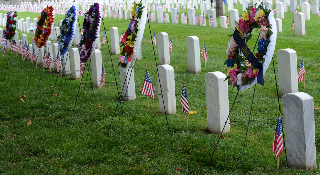 U.S. military members honored fallen veterans during a Memorial Day ceremony at the Hampton National Cemetery in Hampton, Va., May 30, 2016. The observance grew from Decoration Day, a tradition which began to honor those U.S. Service members who died during the Civil War. (U.S. Air Force photo by Staff Sgt. Teresa J. Cleveland)