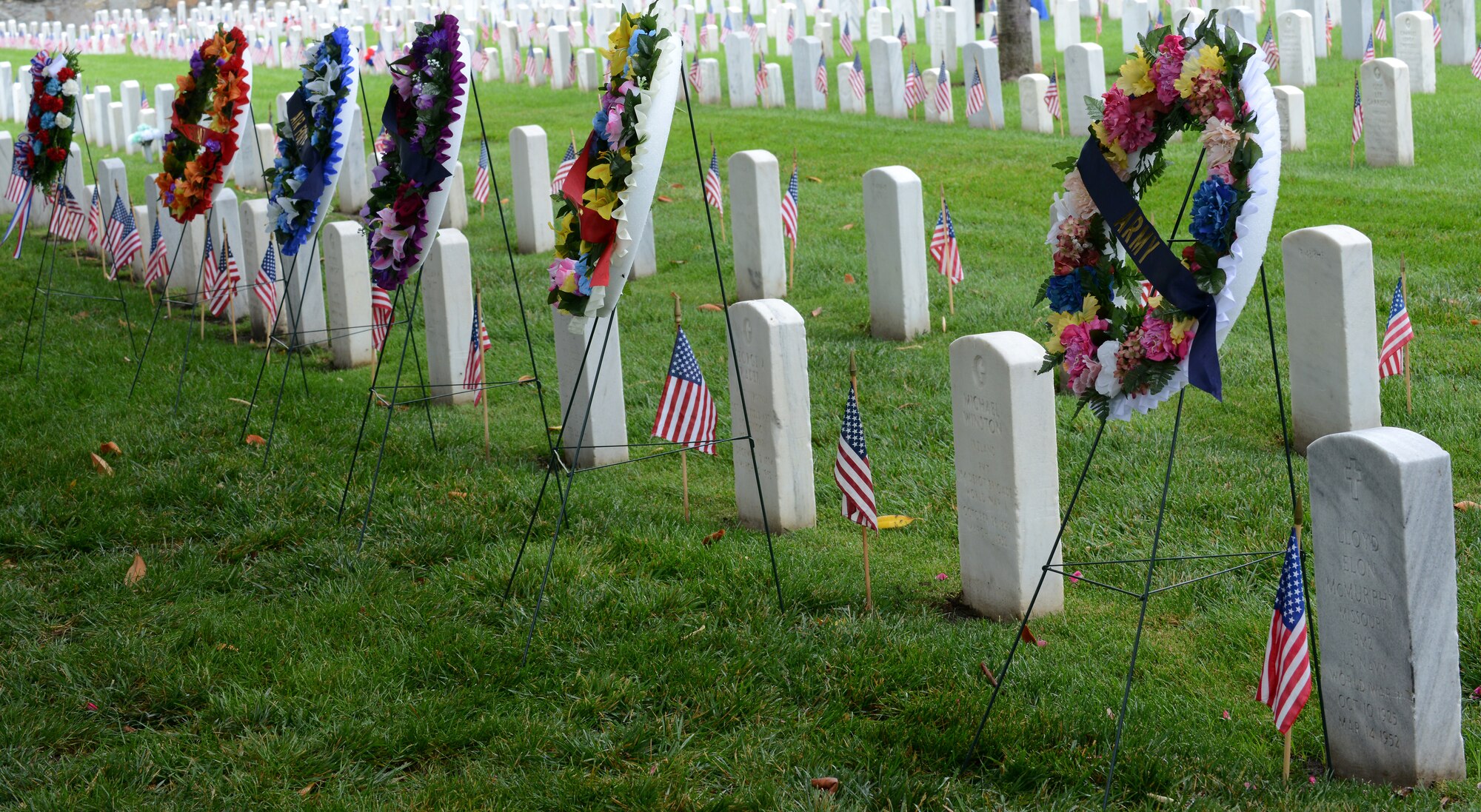 U.S. military members honored fallen veterans during a Memorial Day ceremony at the Hampton National Cemetery in Hampton, Va., May 30, 2016. The observance grew from Decoration Day, a tradition which began to honor those U.S. Service members who died during the Civil War. (U.S. Air Force photo by Staff Sgt. Teresa J. Cleveland)