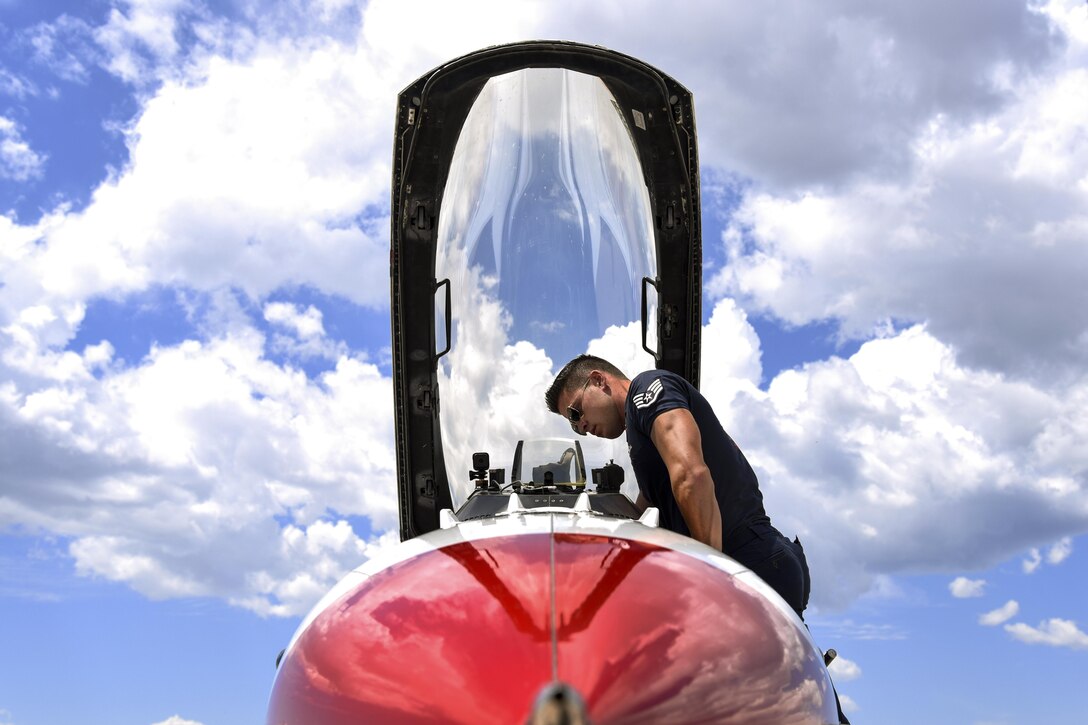 Air Force Staff Sgt. Andrew Molina inspects an aircraft after a flight at Peterson Air Force Base, Colo., May 30, 2016. The Thunderbirds, the Air Force's demonstration squadron, are in Colorado to prepare for a flyover at the U.S. Air Force Academy graduation. Molina is a  Thunderbirds aircraft structural maintainer. Air Force photo by Airman 1st Class Dennis Hoffman