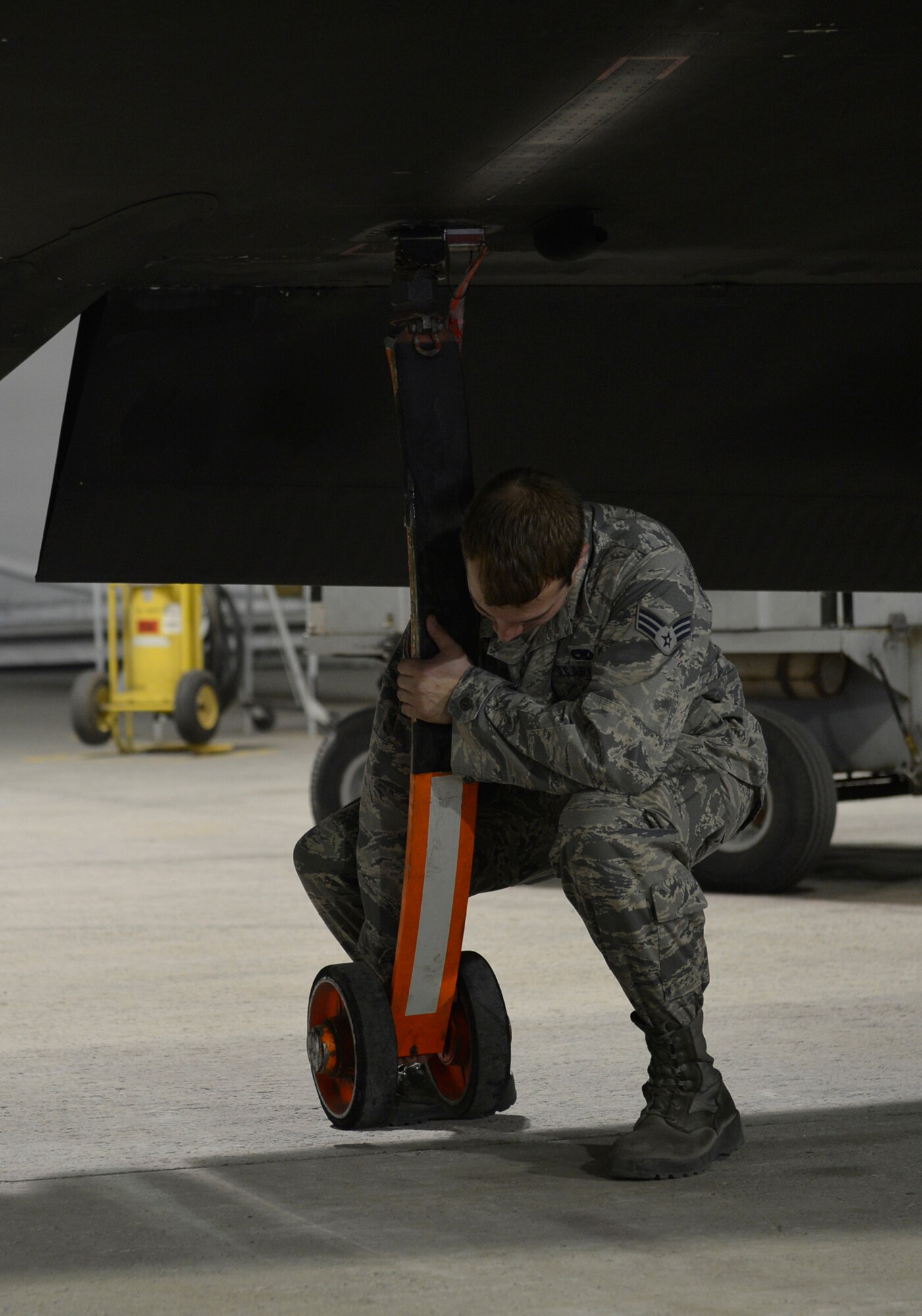 A 380th Expeditionary Maintenance Group U-2 Dragon Lady maintainer inspects the wing of a U-2 at an undisclosed location in Southwest Asia May 24, 2016. The U-2 provides high-altitude, all-weather surveillance and reconnaissance in direct support of U.S. and allied forces.