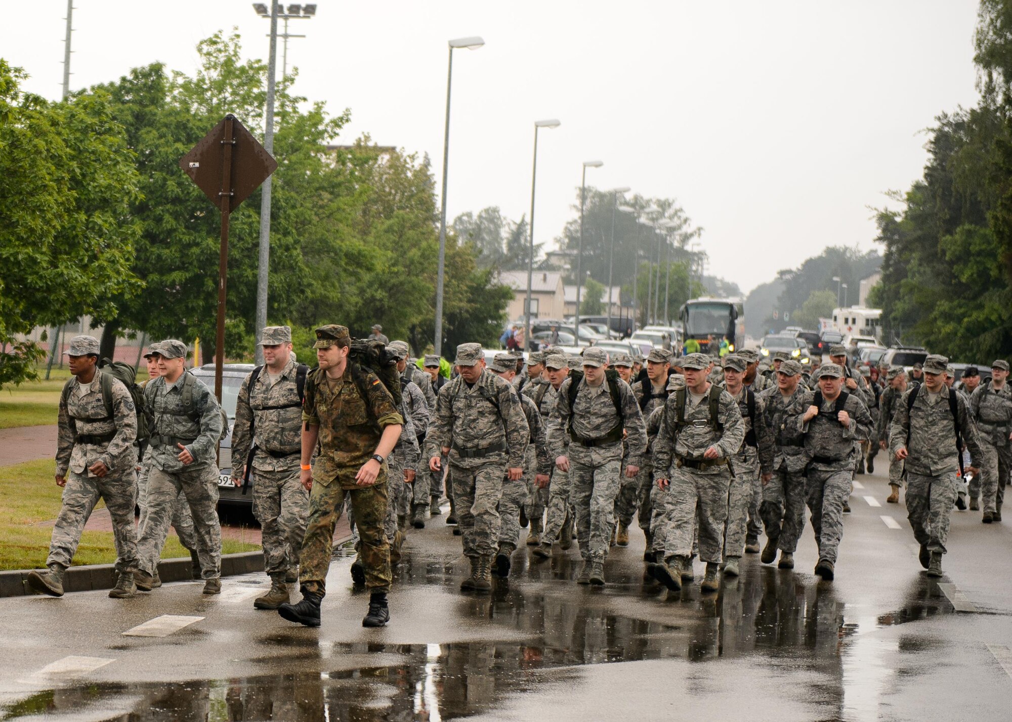 Members of the Kaiserslautern Military Community march during the first Chief Master Sgt. Paul Airey Memorial ruck-run at Ramstein Air Base, Germany, May 27, 2016. The ruck-run was completed by more than 300 participants in remembrance of the march Airey completed as a prisoner of war. (U.S. Air Force photo/Staff Sgt. Armando A. Schwier-Morales)