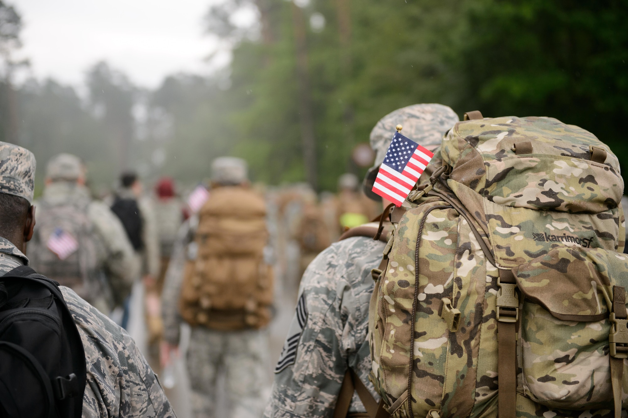 Chief master sergeants ruck march during the first Chief Master Sgt. Paul Airey Memorial Ruck-Run at Ramstein Air Base, Germany, May 27, 2016. Airmen, Soldiers and family members participated in the ruck-run as teams and individuals. (U.S. Air Force photo/Staff Sgt. Armando A. Schwier-Morales)