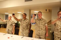 NAVAL SUPPORT FACILITY INDIAN HEAD, Md. – Corporals with Chemical Biological Incident Response Force (CBIRF), U.S. Marine Corps Forces Command (MARFORCOM), graduate from command sponsored Corporals Leadership Course during a ceremony at Naval Support Facility Indian Head, Md., May 27, 2016. The night before, the Marines tested their refined customs and courtesies during a Mess Night with Gunnery Sgt. Amber T. Chavarria, faculty advisor at Staff Noncommissioned Officer Academy, Marine Corps Base Quantico, Va., as the event’s guest of honor. The noncommissioned officers completed the 3 week course curriculum that included sword and guidon manual, land navigation, Marine Corps promotion system for sergeants and below and other small unit leader skills and traits. (Official USMC Photos by Sgt. Santiago G. Colon Jr. and Sgt. Jonathan S. Herrera)