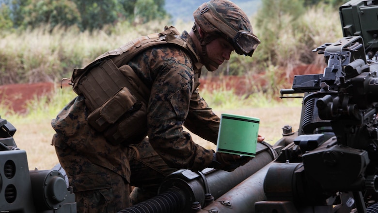 Lance Cpl. Jesse Hartman, a field artillery cannoneer with Alpha Battery, 1st Battalion, 12th Marine Regiment, “Kings of Battle,” and a Fort Ashby, W. Va., native, prepares to help rearm an M777 Lightweight 155mm howitzer during Spartan Fury, an annual pre-deployment exercise, aboard the Schofield Range Facility on May 4th, 2016.  Spartan Fury is one of three annual battalion level exercises to help improve sustainment training for future deployments. The objective of this five-day exercise is to support 3rd Regiment by providing direct and indirect artillery strikes. 