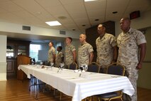 NAVAL SUPPORT FACILITY INDIAN HEAD, Md. – Corporals with Chemical Biological Incident Response Force (CBIRF), U.S. Marine Corps Forces Command (MARFORCOM), graduate from command sponsored Corporals Leadership Course during a ceremony at Naval Support Facility Indian Head, Md., May 27, 2016. The night before, the Marines tested their refined customs and courtesies during a Mess Night with Gunnery Sgt. Amber T. Chavarria, faculty advisor at Staff Noncommissioned Officer Academy, Marine Corps Base Quantico, Va., as the event’s guest of honor. The noncommissioned officers completed the 3 week course curriculum that included sword and guidon manual, land navigation, Marine Corps promotion system for sergeants and below and other small unit leader skills and traits. (Official USMC Photos by Sgt. Santiago G. Colon Jr. and Sgt. Jonathan S. Herrera)