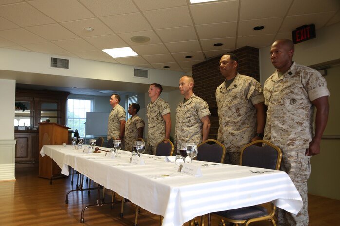 NAVAL SUPPORT FACILITY INDIAN HEAD, Md. – Corporals with Chemical Biological Incident Response Force (CBIRF), U.S. Marine Corps Forces Command (MARFORCOM), graduate from command sponsored Corporals Leadership Course during a ceremony at Naval Support Facility Indian Head, Md., May 27, 2016. The night before, the Marines tested their refined customs and courtesies during a Mess Night with Gunnery Sgt. Amber T. Chavarria, faculty advisor at Staff Noncommissioned Officer Academy, Marine Corps Base Quantico, Va., as the event’s guest of honor. The noncommissioned officers completed the 3 week course curriculum that included sword and guidon manual, land navigation, Marine Corps promotion system for sergeants and below and other small unit leader skills and traits. (Official USMC Photos by Sgt. Santiago G. Colon Jr. and Sgt. Jonathan S. Herrera)