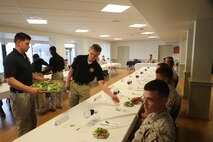 NAVAL SUPPORT FACILITY INDIAN HEAD, Md. – Corporals with Chemical Biological Incident Response Force (CBIRF), U.S. Marine Corps Forces Command (MARFORCOM), graduate from command sponsored Corporals Leadership Course during a ceremony at Naval Support Facility Indian Head, Md., May 27, 2016. The night before, the Marines tested their refined customs and courtesies during a Mess Night with Gunnery Sgt. Amber T. Chavarria, faculty advisor at Staff Noncommissioned Officer Academy, Marine Corps Base Quantico, Va., as the event’s guest of honor. The noncommissioned officers completed the 3 week course curriculum that included sword and guidon manual, land navigation, Marine Corps promotion system for sergeants and below and other small unit leader skills and traits. (Official USMC Photos by Sgt. Santiago G. Colon Jr. and Sgt. Jonathan S. Herrera)