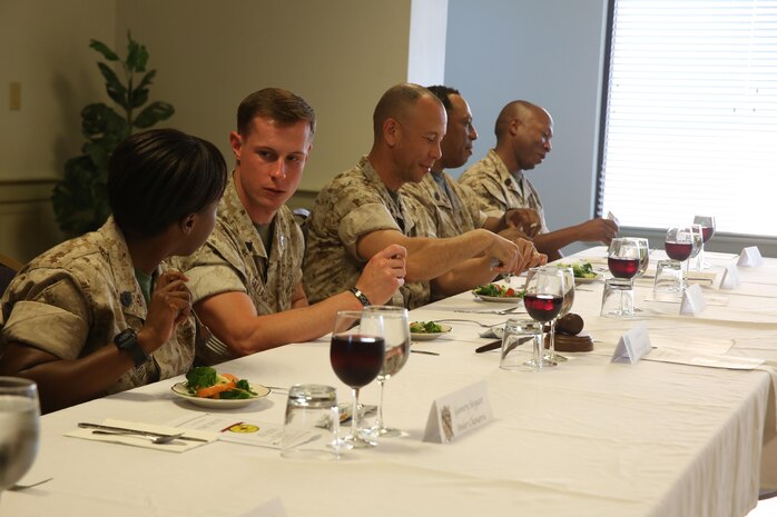 NAVAL SUPPORT FACILITY INDIAN HEAD, Md. – Corporals with Chemical Biological Incident Response Force (CBIRF), U.S. Marine Corps Forces Command (MARFORCOM), graduate from command sponsored Corporals Leadership Course during a ceremony at Naval Support Facility Indian Head, Md., May 27, 2016. The night before, the Marines tested their refined customs and courtesies during a Mess Night with Gunnery Sgt. Amber T. Chavarria, faculty advisor at Staff Noncommissioned Officer Academy, Marine Corps Base Quantico, Va., as the event’s guest of honor. The noncommissioned officers completed the 3 week course curriculum that included sword and guidon manual, land navigation, Marine Corps promotion system for sergeants and below and other small unit leader skills and traits. (Official USMC Photos by Sgt. Santiago G. Colon Jr. and Sgt. Jonathan S. Herrera)