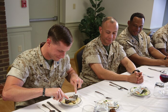 NAVAL SUPPORT FACILITY INDIAN HEAD, Md. – Corporals with Chemical Biological Incident Response Force (CBIRF), U.S. Marine Corps Forces Command (MARFORCOM), graduate from command sponsored Corporals Leadership Course during a ceremony at Naval Support Facility Indian Head, Md., May 27, 2016. The night before, the Marines tested their refined customs and courtesies during a Mess Night with Gunnery Sgt. Amber T. Chavarria, faculty advisor at Staff Noncommissioned Officer Academy, Marine Corps Base Quantico, Va., as the event’s guest of honor. The noncommissioned officers completed the 3 week course curriculum that included sword and guidon manual, land navigation, Marine Corps promotion system for sergeants and below and other small unit leader skills and traits. (Official USMC Photos by Sgt. Santiago G. Colon Jr. and Sgt. Jonathan S. Herrera)
