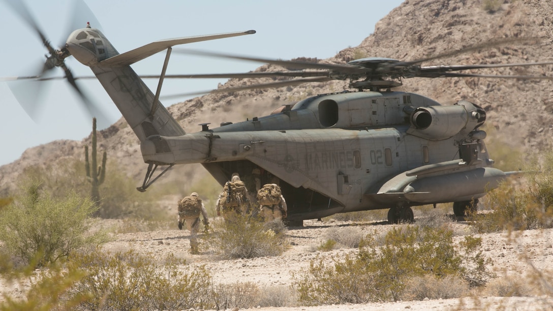 Scout snipers with 2nd Battalion, 8th Marine Regiment, board a CH-53 ‘Super Stallion’ for extraction from the Combat Ville training area aboard Marine Corps Air Station Yuma, Ariz., during Integrated Training Exercise 3-16, May 29, 2016. 