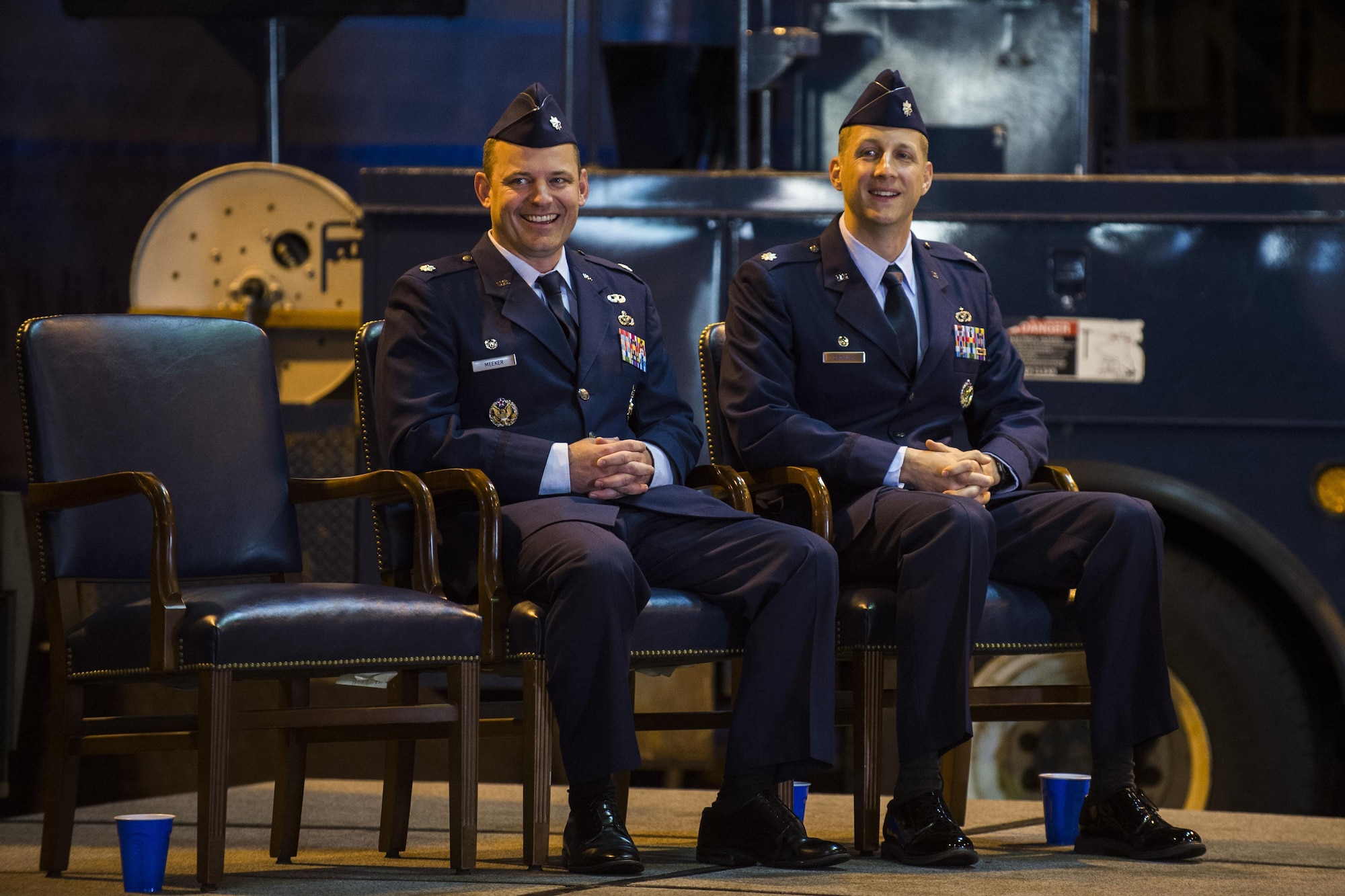 U.S. Air Force Lt. Col. Christopher Meeker, former 52nd Civil Engineer Squadron commander, left, and U.S. Air Force Lt. Col. Ryan Crowley, 52nd CES commander, smile during the 52nd CES change of command at Spangdahlem Air Base, Germany, June 1, 2016. Crowley assumed command of the 52nd CES from Meeker. (U.S. Air Force photo by Senior Airman Luke Kitterman/Released)