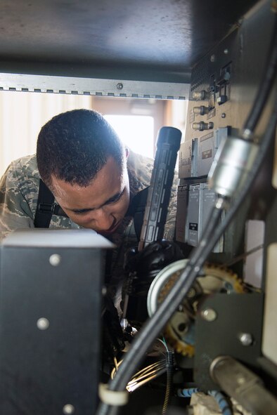 U.S. Air Force Airman 1st Class Marco Lamar, 23d Equipment Maintenance Squadron aerospace ground equipment specialist, connects fuel filter wires for a light cart, June 1, 2016, at Moody Air Force Base, Ga. The light cart is used to illuminate the installation’s flightline for night time operations. (U.S. Air Force photo by Airman 1st Class Greg Nash/Released) 