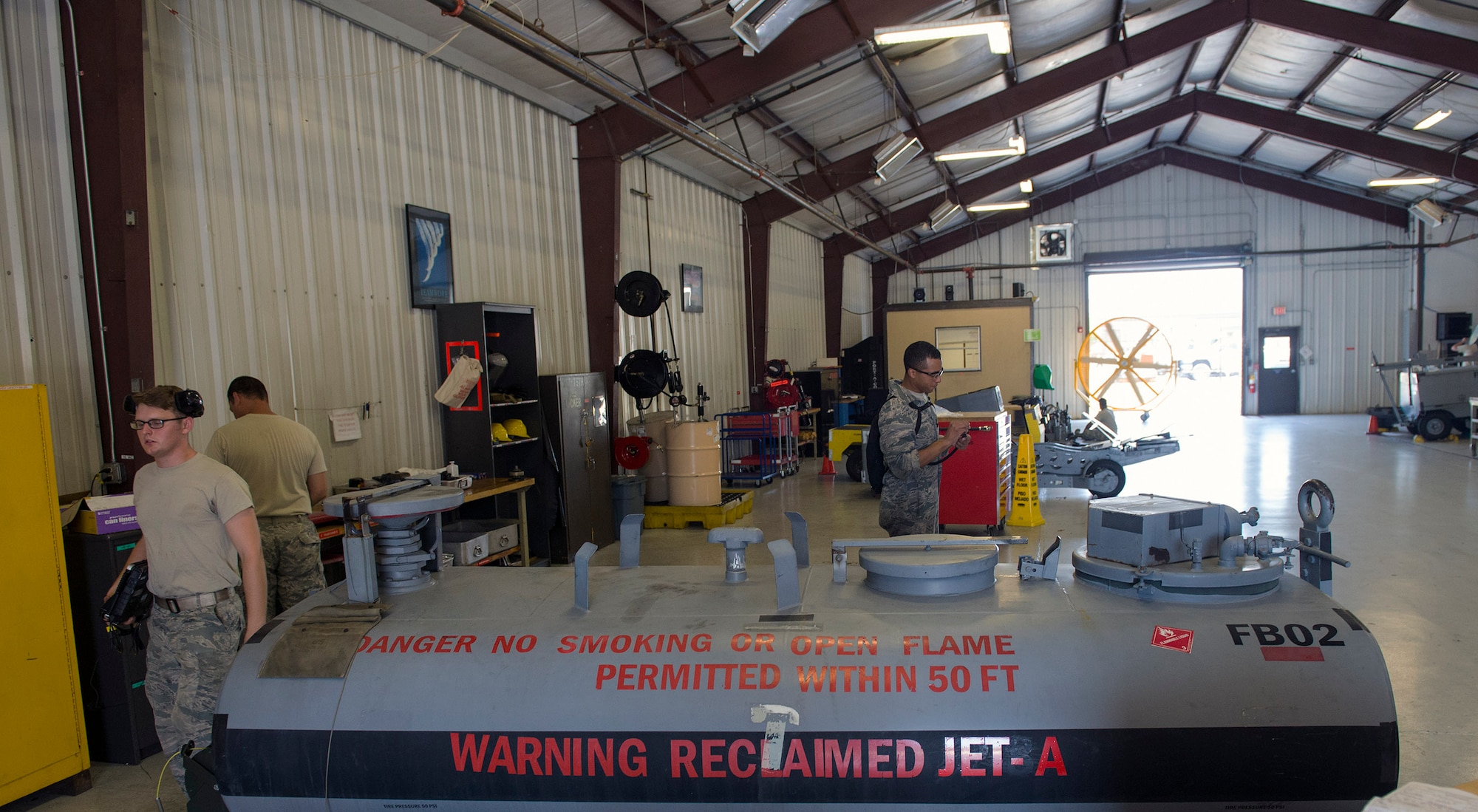 Aerospace ground equipment specialists from the 23d Equipment Maintenance Squadron maintain electrical, hydraulic pressure and air pressure components to Moody’s aircraft, June 1, 2016, at Moody Air Force Base, Ga. AGE Flight specialists operate and sustain approximately 600 equipment items valued at $24 million that ensures the optimal performance of Moody’s HC-130J Combat King IIs, A-10C Thunderbolt IIs and HH-60G Pave Hawks. (U.S. Air Force photo by Airman 1st Class Greg Nash/Released) 