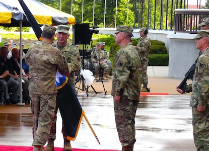 Lt. Gen. Jeffrey W. Talley, Chief of Army Reserve and Commanding General of  U.S. Army Reserve Command, , relinquishes the USARC flag to Gen. Robert B. Abrams, Commanding General U.S. Army Forces Command, which is handed back to Command Sgt. Maj. Jim Wils, USAR Command Sgt. Maj., during the U.S. Army Reserve Command Relinquishment of Command Ceremony held at Marshall Hall, Fort Bragg, N.C., June 1, 2016. The ceremony recognized and honored the contribution the Talley family has given to the U.S. Army Reserve as Lt. Gen. Talley relinquishes his command with the exchange of the command flag. (U.S. Army Reserve photo by Lt. Col. Kristian Sorensen)