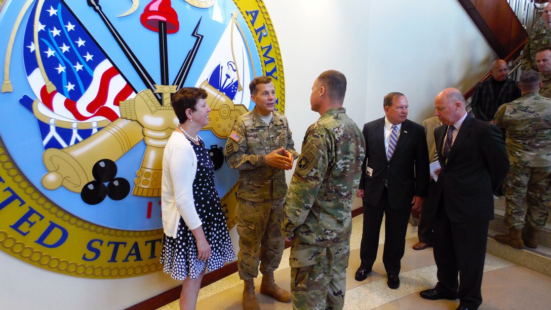 Lt. Gen. Jeffrey W. Talley, Chief of Army Reserve and Commanding General of  U.S. Army Reserve Command, and wife, Linda Talley, receive guest waiting to wish them farewell after the U.S. Army Reserve Command Relinquishment of Command Ceremony held at Marshall Hall, Fort Bragg, N.C., June 1, 2016. The ceremony recognized and honored the contribution the Talley family has given to the U.S. Army Reserve as Lt. Gen. Talley relinquishes his command prior to the appointment of his replacement. (U.S. Army Reserve photo by Lt. Col. Kristian Sorensen)