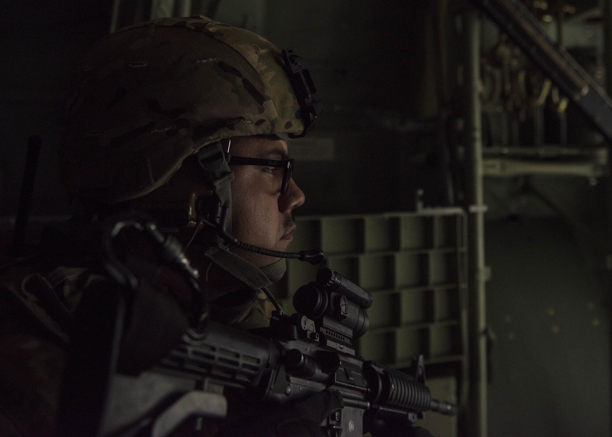Staff Sgt. Jesus Mora, 455th Expeditionary Security Forces Squadron fly away security team lead, provides security for a C-130J Super Hercules while it executes a combat cargo drop, Multinational Base Tarin Kowt, Afghanistan, June 1, 2016. FAST members are responsible for protecting aircraft, military members and cargo during routine stops at unsecure airfields. (U.S. Air Force photo by Senior Airman Justyn M. Freeman)