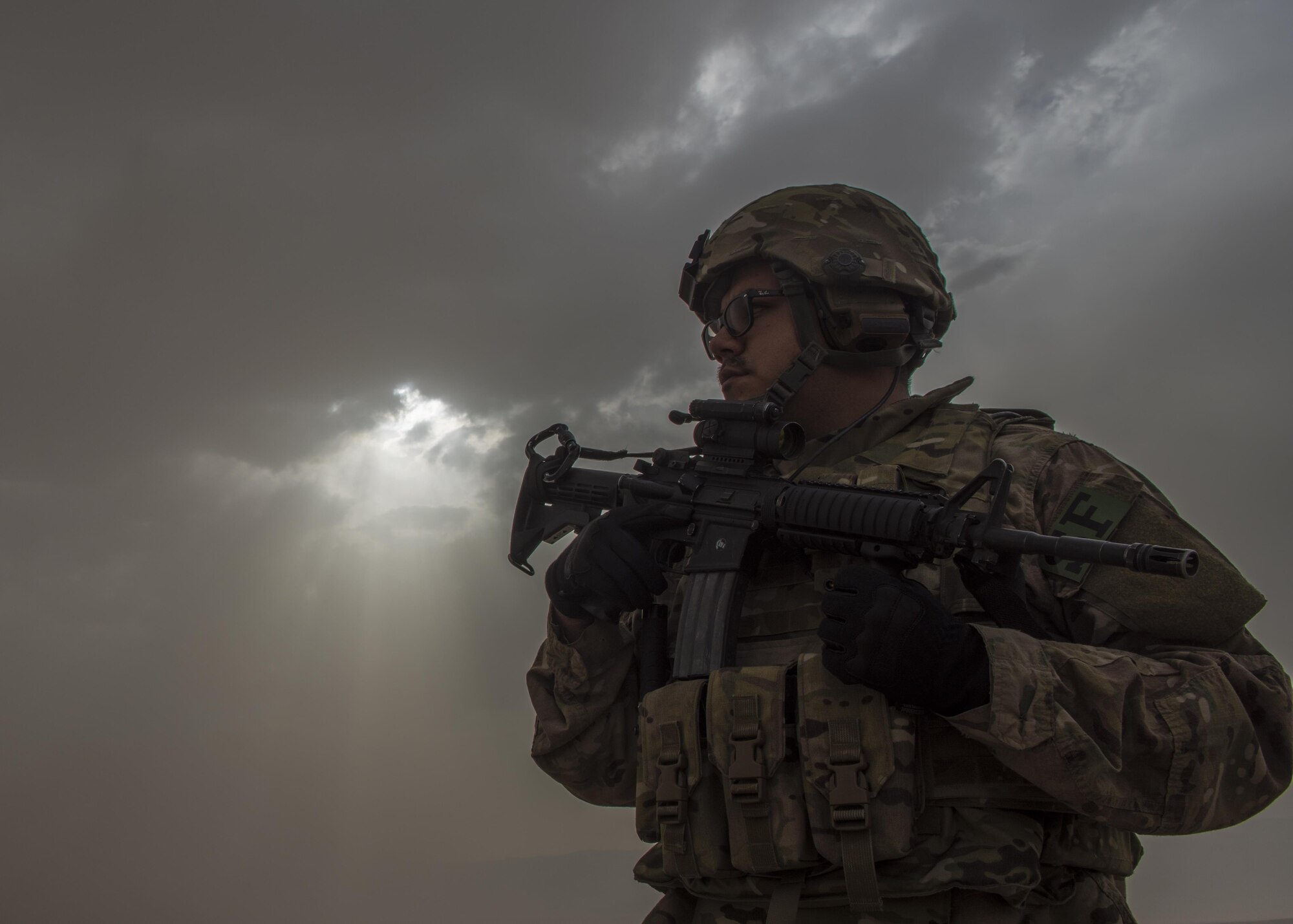 Staff Sgt. Jesus Mora, 455th Expeditionary Security Forces Squadron fly away security team lead, provides security for a C-130J Super Hercules while it executes a combat cargo drop, Multinational Base Tarin Kowt, Afghanistan, June 1, 2016. FAST provides security for aircraft and crews in locations where little to no security is available. (U.S. Air Force photo by Senior Airman Justyn M. Freeman)