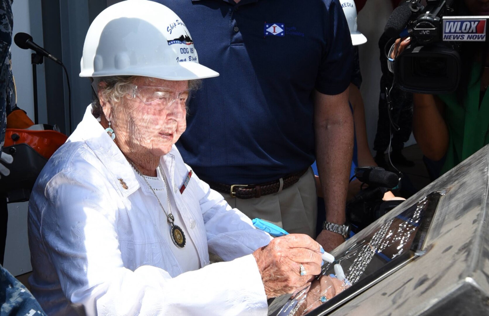 PASCAGOULA, Miss. (June 1, 2016) - Mrs. Ima Black places her initials onto the keel plate of DDG 119 during the ceremony authenticating the keel of the future USS Delbert D. Black. The destroyer was named in honor of Black’s late husband Delbert Black, the first Master Chief Petty Officer of the Navy. The Flight IIA Arleigh Burke class ship will serve as an integral player in global maritime security, engaging in air, undersea, surface, strike and ballistic missile defense.