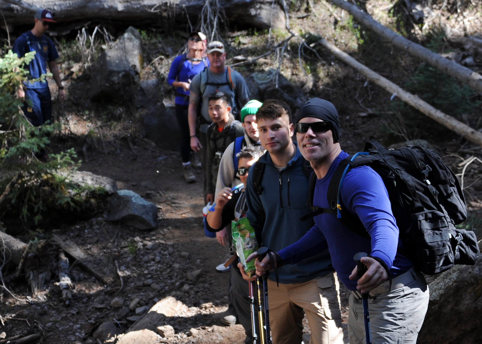 Participants of the U.S. Air Force 50 Summits Challenge hike up a mountain trail to Humphreys Peak Ariz., May 29, 2016. The level of hiking experience varied among the participants, with times ranging from eight to eleven hours to champion the 12,633 foot peak. (U.S. Air Force photo by Airman 1st Class Ashley N. Steffen/Released)