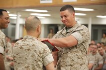 NAVAL SUPPORT FACILITY INDIAN HEAD, Md. – Corporals with Chemical Biological Incident Response Force (CBIRF), U.S. Marine Corps Forces Command (MARFORCOM), graduate from command sponsored Corporals Leadership Course during a ceremony at Naval Support Facility Indian Head, Md., May 27, 2016. The night before, the Marines tested their refined customs and courtesies during a Mess Night with Gunnery Sgt. Amber T. Chavarria, faculty advisor at Staff Noncommissioned Officer Academy, Marine Corps Base Quantico, Va., as the event’s guest of honor. The noncommissioned officers completed the 3 week course curriculum that included sword and guidon manual, land navigation, Marine Corps promotion system for sergeants and below and other small unit leader skills and traits. (Official USMC Photos by Sgt. Santiago G. Colon Jr. and Sgt. Jonathan S. Herrera)