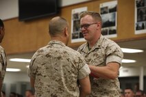 NAVAL SUPPORT FACILITY INDIAN HEAD, Md. – Corporals with Chemical Biological Incident Response Force (CBIRF), U.S. Marine Corps Forces Command (MARFORCOM), graduate from command sponsored Corporals Leadership Course during a ceremony at Naval Support Facility Indian Head, Md., May 27, 2016. The night before, the Marines tested their refined customs and courtesies during a Mess Night with Gunnery Sgt. Amber T. Chavarria, faculty advisor at Staff Noncommissioned Officer Academy, Marine Corps Base Quantico, Va., as the event’s guest of honor. The noncommissioned officers completed the 3 week course curriculum that included sword and guidon manual, land navigation, Marine Corps promotion system for sergeants and below and other small unit leader skills and traits. (Official USMC Photos by Sgt. Santiago G. Colon Jr. and Sgt. Jonathan S. Herrera)