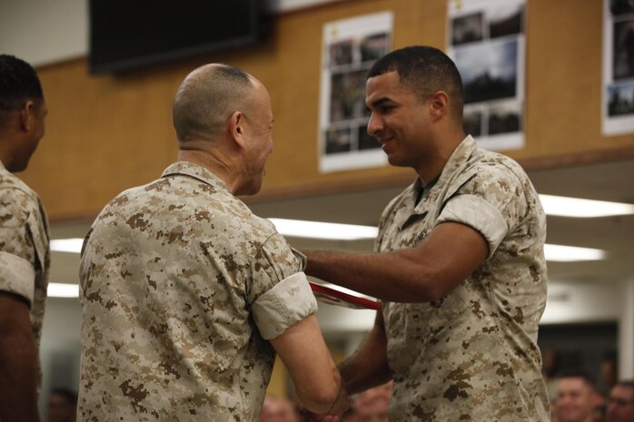 NAVAL SUPPORT FACILITY INDIAN HEAD, Md. – Corporals with Chemical Biological Incident Response Force (CBIRF), U.S. Marine Corps Forces Command (MARFORCOM), graduate from command sponsored Corporals Leadership Course during a ceremony at Naval Support Facility Indian Head, Md., May 27, 2016. The night before, the Marines tested their refined customs and courtesies during a Mess Night with Gunnery Sgt. Amber T. Chavarria, faculty advisor at Staff Noncommissioned Officer Academy, Marine Corps Base Quantico, Va., as the event’s guest of honor. The noncommissioned officers completed the 3 week course curriculum that included sword and guidon manual, land navigation, Marine Corps promotion system for sergeants and below and other small unit leader skills and traits. (Official USMC Photos by Sgt. Santiago G. Colon Jr. and Sgt. Jonathan S. Herrera)