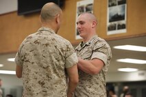 NAVAL SUPPORT FACILITY INDIAN HEAD, Md. – Corporals with Chemical Biological Incident Response Force (CBIRF), U.S. Marine Corps Forces Command (MARFORCOM), graduate from command sponsored Corporals Leadership Course during a ceremony at Naval Support Facility Indian Head, Md., May 27, 2016. The night before, the Marines tested their refined customs and courtesies during a Mess Night with Gunnery Sgt. Amber T. Chavarria, faculty advisor at Staff Noncommissioned Officer Academy, Marine Corps Base Quantico, Va., as the event’s guest of honor. The noncommissioned officers completed the 3 week course curriculum that included sword and guidon manual, land navigation, Marine Corps promotion system for sergeants and below and other small unit leader skills and traits. (Official USMC Photos by Sgt. Santiago G. Colon Jr. and Sgt. Jonathan S. Herrera)