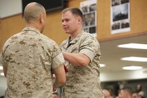 NAVAL SUPPORT FACILITY INDIAN HEAD, Md. – Corporals with Chemical Biological Incident Response Force (CBIRF), U.S. Marine Corps Forces Command (MARFORCOM), graduate from command sponsored Corporals Leadership Course during a ceremony at Naval Support Facility Indian Head, Md., May 27, 2016. The night before, the Marines tested their refined customs and courtesies during a Mess Night with Gunnery Sgt. Amber T. Chavarria, faculty advisor at Staff Noncommissioned Officer Academy, Marine Corps Base Quantico, Va., as the event’s guest of honor. The noncommissioned officers completed the 3 week course curriculum that included sword and guidon manual, land navigation, Marine Corps promotion system for sergeants and below and other small unit leader skills and traits. (Official USMC Photos by Sgt. Santiago G. Colon Jr. and Sgt. Jonathan S. Herrera)