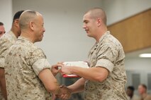NAVAL SUPPORT FACILITY INDIAN HEAD, Md. – Corporals with Chemical Biological Incident Response Force (CBIRF), U.S. Marine Corps Forces Command (MARFORCOM), graduate from command sponsored Corporals Leadership Course during a ceremony at Naval Support Facility Indian Head, Md., May 27, 2016. The night before, the Marines tested their refined customs and courtesies during a Mess Night with Gunnery Sgt. Amber T. Chavarria, faculty advisor at Staff Noncommissioned Officer Academy, Marine Corps Base Quantico, Va., as the event’s guest of honor. The noncommissioned officers completed the 3 week course curriculum that included sword and guidon manual, land navigation, Marine Corps promotion system for sergeants and below and other small unit leader skills and traits. (Official USMC Photos by Sgt. Santiago G. Colon Jr. and Sgt. Jonathan S. Herrera)