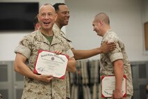 NAVAL SUPPORT FACILITY INDIAN HEAD, Md. – Corporals with Chemical Biological Incident Response Force (CBIRF), U.S. Marine Corps Forces Command (MARFORCOM), graduate from command sponsored Corporals Leadership Course during a ceremony at Naval Support Facility Indian Head, Md., May 27, 2016. The night before, the Marines tested their refined customs and courtesies during a Mess Night with Gunnery Sgt. Amber T. Chavarria, faculty advisor at Staff Noncommissioned Officer Academy, Marine Corps Base Quantico, Va., as the event’s guest of honor. The noncommissioned officers completed the 3 week course curriculum that included sword and guidon manual, land navigation, Marine Corps promotion system for sergeants and below and other small unit leader skills and traits. (Official USMC Photos by Sgt. Santiago G. Colon Jr. and Sgt. Jonathan S. Herrera)
