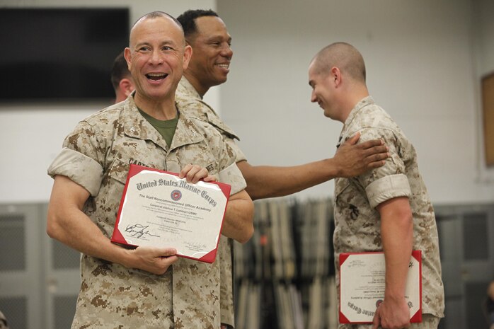 NAVAL SUPPORT FACILITY INDIAN HEAD, Md. – Corporals with Chemical Biological Incident Response Force (CBIRF), U.S. Marine Corps Forces Command (MARFORCOM), graduate from command sponsored Corporals Leadership Course during a ceremony at Naval Support Facility Indian Head, Md., May 27, 2016. The night before, the Marines tested their refined customs and courtesies during a Mess Night with Gunnery Sgt. Amber T. Chavarria, faculty advisor at Staff Noncommissioned Officer Academy, Marine Corps Base Quantico, Va., as the event’s guest of honor. The noncommissioned officers completed the 3 week course curriculum that included sword and guidon manual, land navigation, Marine Corps promotion system for sergeants and below and other small unit leader skills and traits. (Official USMC Photos by Sgt. Santiago G. Colon Jr. and Sgt. Jonathan S. Herrera)
