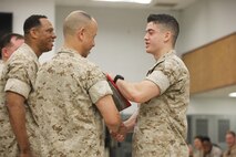 NAVAL SUPPORT FACILITY INDIAN HEAD, Md. – Corporals with Chemical Biological Incident Response Force (CBIRF), U.S. Marine Corps Forces Command (MARFORCOM), graduate from command sponsored Corporals Leadership Course during a ceremony at Naval Support Facility Indian Head, Md., May 27, 2016. The night before, the Marines tested their refined customs and courtesies during a Mess Night with Gunnery Sgt. Amber T. Chavarria, faculty advisor at Staff Noncommissioned Officer Academy, Marine Corps Base Quantico, Va., as the event’s guest of honor. The noncommissioned officers completed the 3 week course curriculum that included sword and guidon manual, land navigation, Marine Corps promotion system for sergeants and below and other small unit leader skills and traits. (Official USMC Photos by Sgt. Santiago G. Colon Jr. and Sgt. Jonathan S. Herrera)