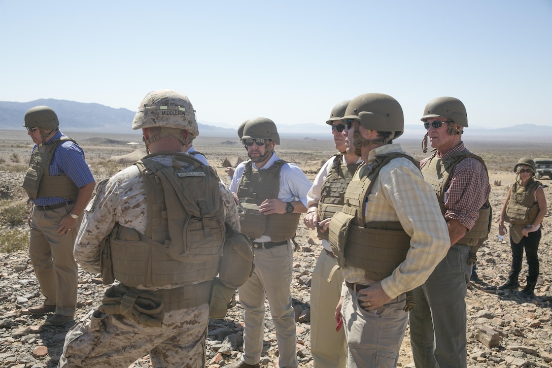 Member of Business Executives for National Security talk with Lt. Col. Brian Middleton, commanding officer, 3rd Battalion, 4th Marines, 7th Regiment, during a live-fire exercise held at Range 410 aboard Marine Corps Air Ground Combat Center, Twentynine Palms Calif., May 19, 2016. (Official Marine Corps photo by Cpl. Thomas Mudd/Released)