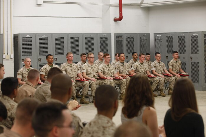 NAVAL SUPPORT FACILITY INDIAN HEAD, Md. – Corporals with Chemical Biological Incident Response Force (CBIRF), U.S. Marine Corps Forces Command (MARFORCOM), graduate from command sponsored Corporals Leadership Course during a ceremony at Naval Support Facility Indian Head, Md., May 27, 2016. The night before, the Marines tested their refined customs and courtesies during a Mess Night with Gunnery Sgt. Amber T. Chavarria, faculty advisor at Staff Noncommissioned Officer Academy, Marine Corps Base Quantico, Va., as the event’s guest of honor. The noncommissioned officers completed the 3 week course curriculum that included sword and guidon manual, land navigation, Marine Corps promotion system for sergeants and below and other small unit leader skills and traits. (Official USMC Photos by Sgt. Santiago G. Colon Jr. and Sgt. Jonathan S. Herrera)